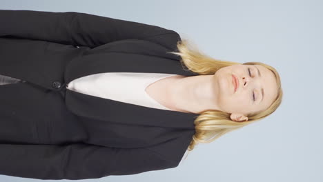 Vertical-video-of-Tired-business-woman.